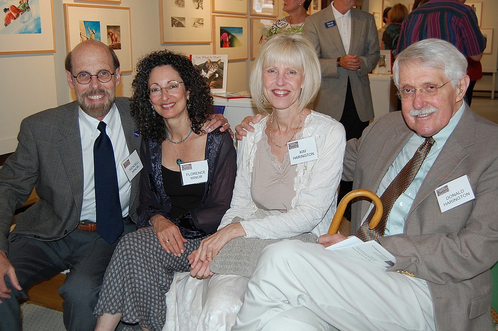 Kim and Donald Harington (on the right) join Wendell and Florence Minor of Washington, Conn., at a social event in northwest Arkansas in 2008; regarding the Haringtons’ relationship, “I saw ourselves as being romantic figures in an almost fairy tale,” Kim said.
(Arkansas Democrat-Gazette file photo)