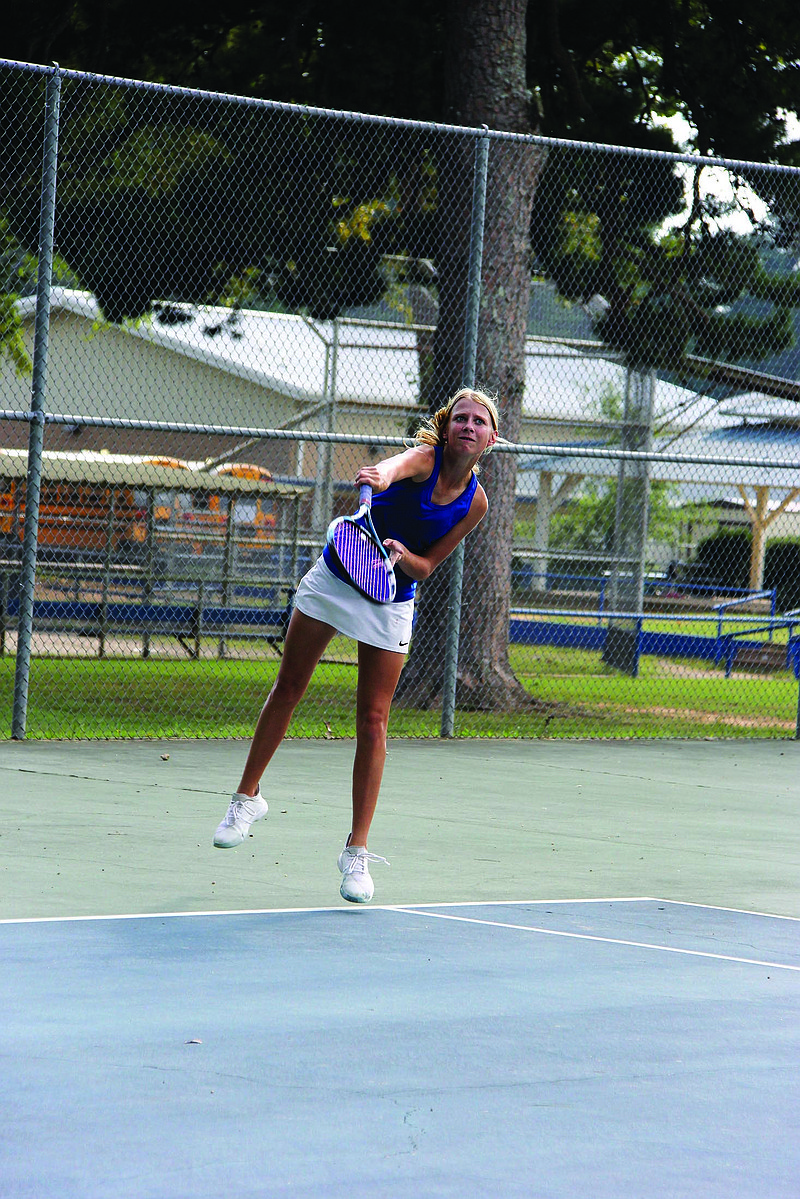 Parkers Chapel's Bella Frisby hits a serve during action this season. The sophomore will compete in the Overall Tennis Tournament on Monday at Burns Park. She played in the Overall Golf Tournament last Thursday. Kallie Martin, Rebekah Hardy, Madison Sullivan and Jackson Dison also qualified for the event.