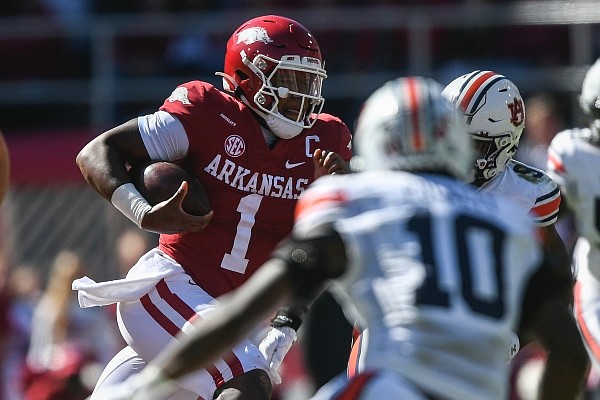Arkansas quarterback KJ Jefferson carries the ball Saturday, Oct. 16, 2021 during the second quarter of a football game at Reynolds Razorback Stadium in Fayetteville. Arkansas quarterback KJ Jefferson carries the ball Saturday, Oct. 16, 2021 during the second quarter of a football game at Reynolds Razorback Stadium in Fayetteville.