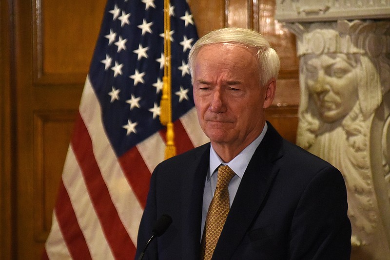 FILE - Gov. Asa Hutchinson answers questions from the press Wednesday, Oct. 20, 2021, during the weekly briefing at the state Capitol. (Arkansas Democrat-Gazette/Staci Vandagriff)