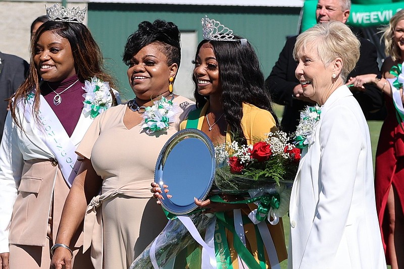 J’Naya Brown of Rison (second from right) was crowned 2021 UAM homecoming queen Saturday at Convoy Leslie Cotton Boll Stadium. Flanking Brown are her mother, Diana Lewis, and UAM Chancellor Peggy Doss.
(Special to The Commercial/UAM Media Relations)