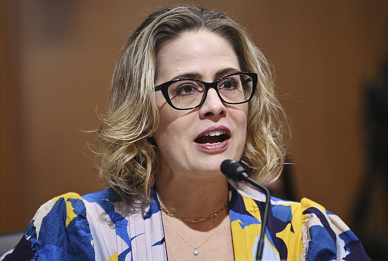 Sen. Kyrsten Sinema, D-Ariz., speaks during the Senate Finance Committee as Chris Magnus testifies on his nomination to be the next U.S. Customs and Border Protection commissioner, Tuesday, Oct. 19, 2021 on Capitol Hill in Washington. (Mandel Ngan/Pool via AP)
