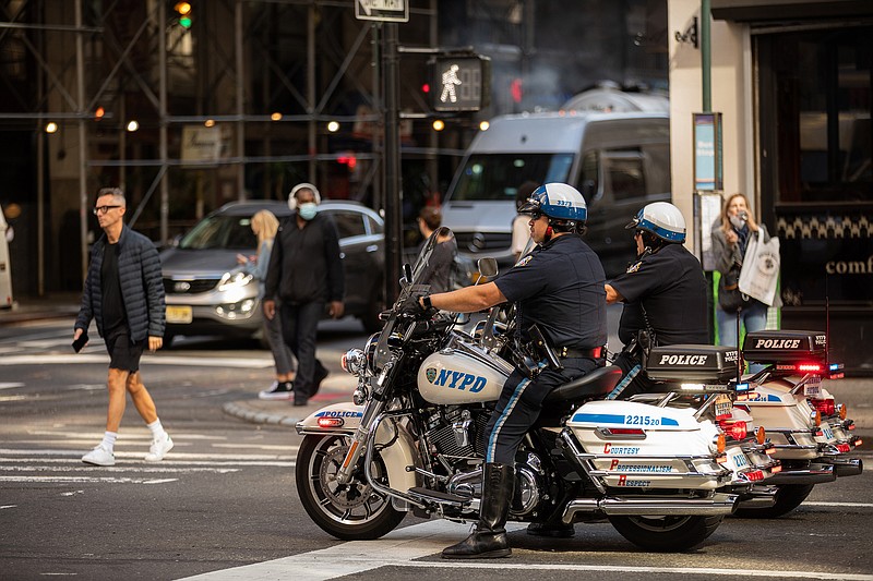 New York police officers patrol Wednesday in Manhattan. The city’s largest police union, the Police Benevolent Association, spoke out against Mayor Bill de Blasio’s ultimatum to city workers to get their covid-19 shots, calling it a “personal medical decision” that officers should make in consultation with their doctors.
(The New York Times/Benjamin Norman)