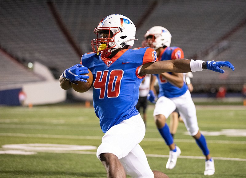 Little Rock Parkview running back Monterrio Elston runs for a touchdown Thursday during the Patriots’  48-7 victory over the Russellville Cyclones at War Memorial Stadium in Little Rock. More photos at arkansasonline.com/1022rhslrp/.
(Arkansas Democrat-Gazette/Justin Cunningham)