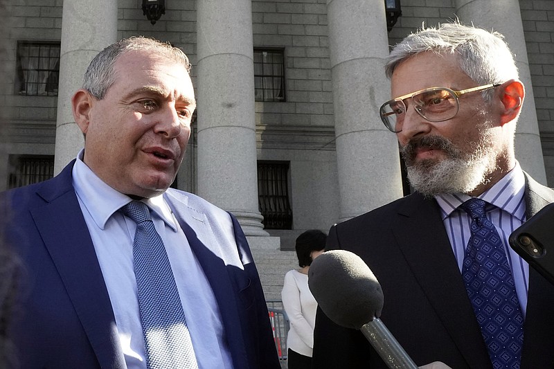 Lev Parnas (left) and his attorney Joseph Bondy, talk to the press outside federal court Friday in New York. Video at arkansasonline.com/1023parnas/
(AP Photo/Richard Drew)