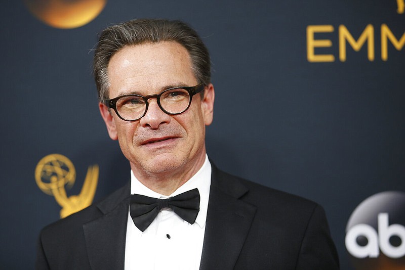 Peter Scolari arrives at the 68th Primetime Emmy Awards at the Microsoft Theater in Los Angeles in this Sept. 18, 2016, file photo. (Danny Moloshok/Invision for the Television Academy/AP Images)