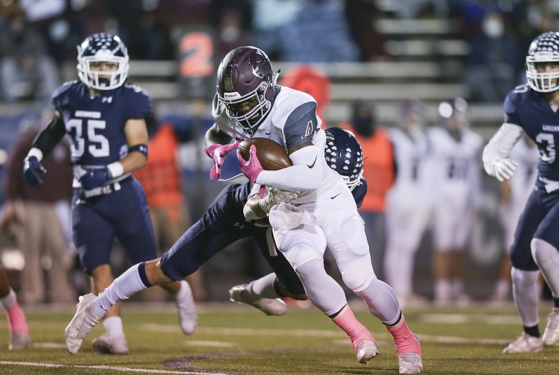 FILE -- Benton wide receiver Andre Lane (4) carries the ball, Friday, October 23, 2020 during a football game at Greenwood High School in Greenwood. 
(NWA Democrat-Gazette/Charlie Kaijo)