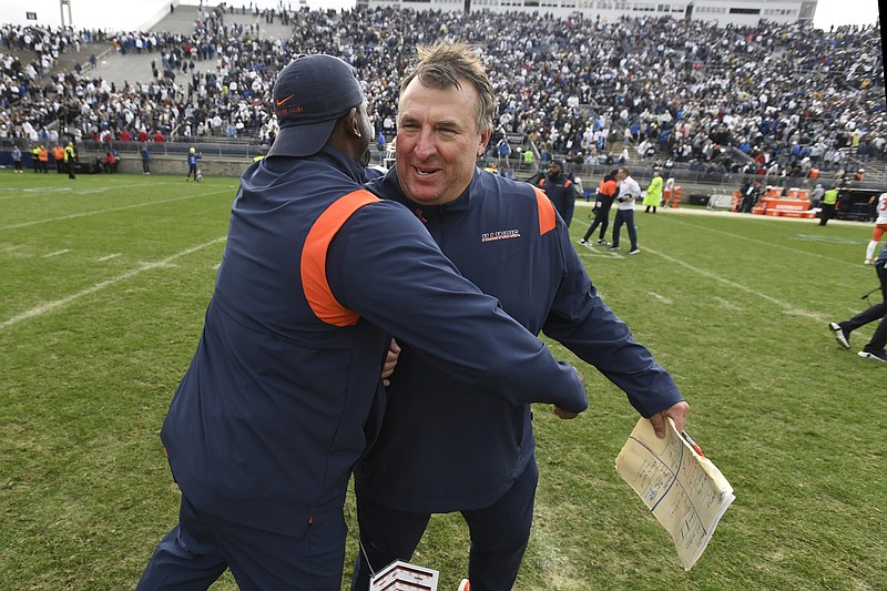 Illinois Coach Bret Bielema, who coached at Arkansas in 2013-17, celebrates after the Illini’s 20-18 victory over No. 7 Penn State in nine overtimes Saturday in State College, Pa. It was Bielema’s 100th career win.
(AP/Barry Reeger)