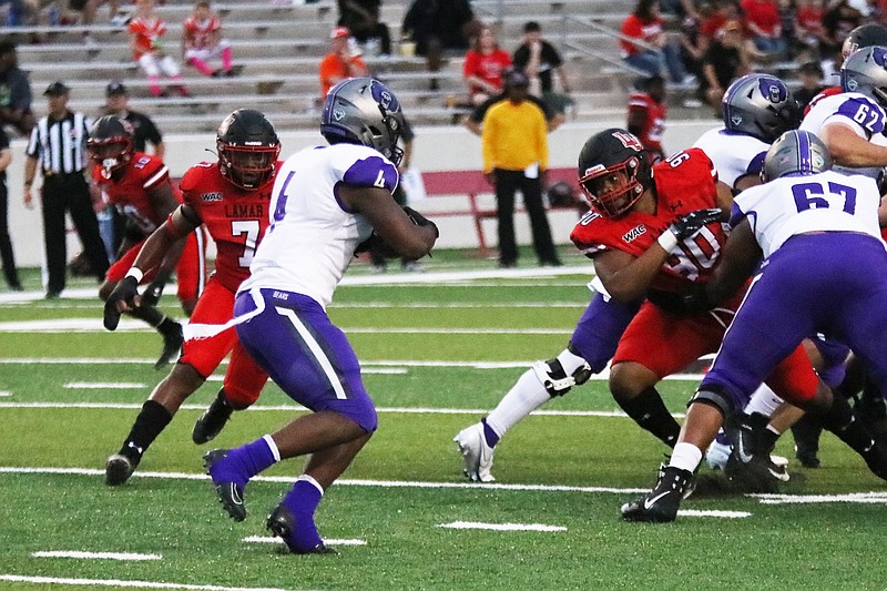UCA running back Darius Hale looks for running room Saturday during the Bears’ 49-38 victory over Lamar in Beaumont, Texas. Hale finished with 254 yards and 4 touchdowns on 22 carries.
(Photo courtesy University of Central Arkansas)