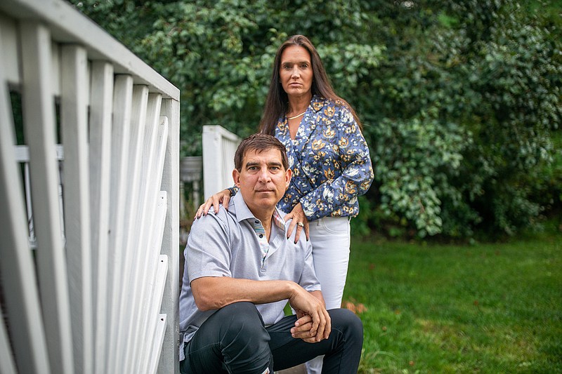 Derek Stipetich, pictured with his wife, Jodie, last month outside their home in Cecil Township, Pa., was one of the first patients in the area to receive a heart transplant directly connected to a covid-19 infection.
(Pittsburgh Post-Gazette/TNS/Andrew Rush)