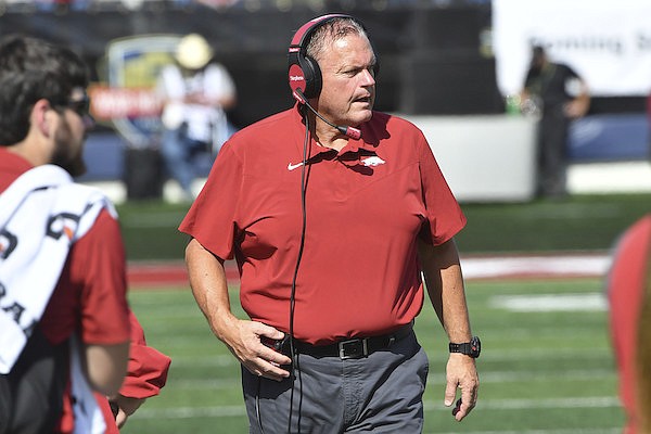 Arkansas coach Sam Pittman paces the sidelines during the second half of an NCAA college football game against Pine Bluff, Saturday, Oct. 23, 2021, in Little Rock. (AP Photo/Michael Woods)