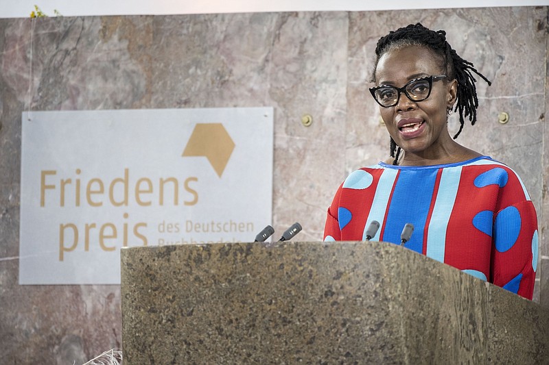 Author Tsitsi Dangarembga, from Zimbabwe, speaks after receiving the Peace Prize of the German Book Trade in Frankfurt, Germany,  Sunday, Oct. 24, 2021 (Thomas Lohnes/epd-Pool/dpa via AP)