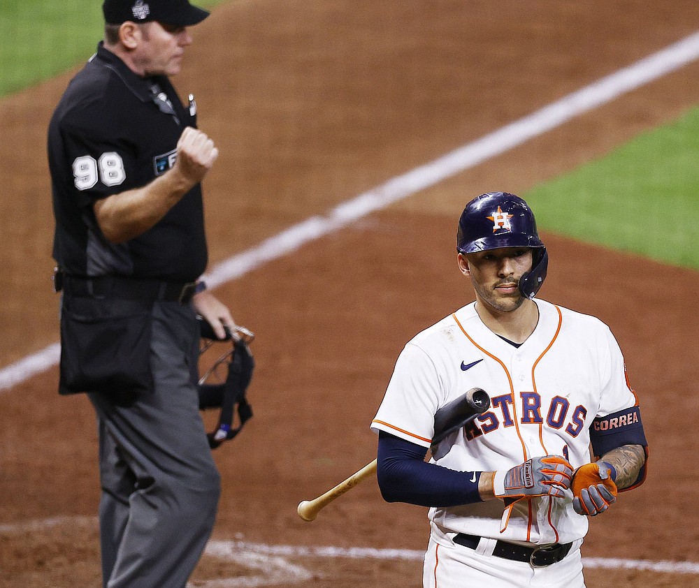 Carlos Correa of the Houston Astros heads back to the dugout after striking out against the Atlanta Braves on Tuesday during Game 1 of the World Series. The series is tied 1-1, but several of the top hitters on both teams are struggling at the plate heading into tonight’s Game 3.
(AP/The Galveston County Daily News/Kevin M. Cox)