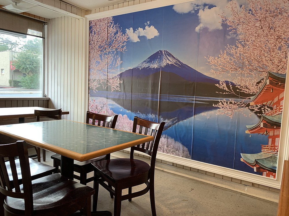Mount Fuji smiles down on diners from the back wall of Fujiyama Sushi & Hibachi Express. (Arkansas Democrat-Gazette/Eric E. Harrison)