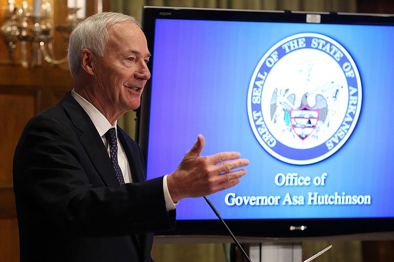 FILE — Gov. Asa Hutchinson answers questions during the weekly Covid-19 update on Tuesday, Nov. 2, 2021, at the state Capitol in Little Rock. (Arkansas Democrat-Gazette/Thomas Metthe)