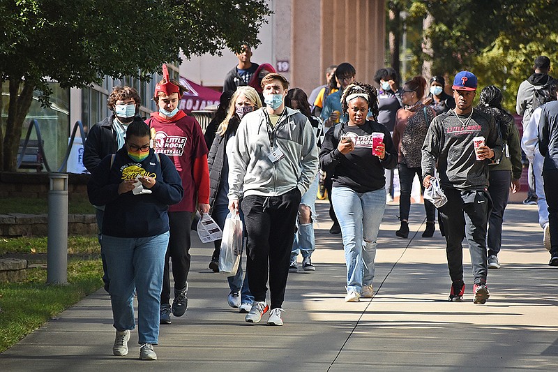 Potential University of Arkansas at Little Rock students walk across campus during Discover, a college preview day, in this Thursday, Nov. 4, 2021 file photo. (Arkansas Democrat-Gazette/Staci Vandagriff)