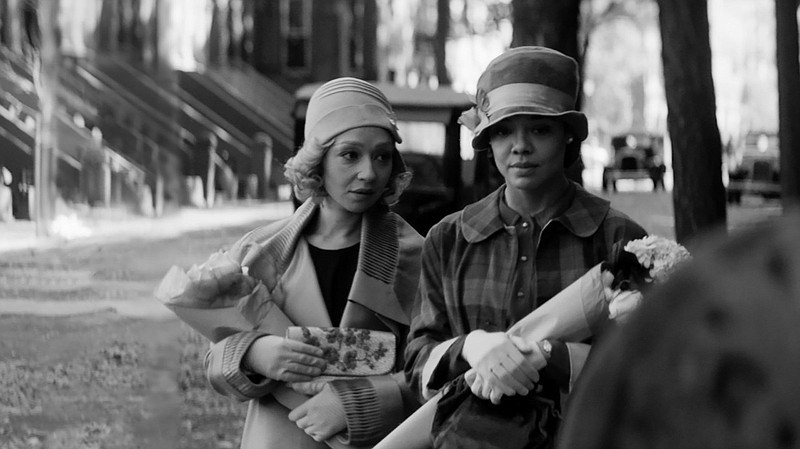 Clare Bellew (Ruth Negga) and Irene “Reenie” Redfield (Tessa Thompson) are mixed-race childhood friends who reunite as adults and keep each others’ secrets in Rebecca Hall’s “Passing,” based on the 1929 novel of the same name by Nella Larsen.