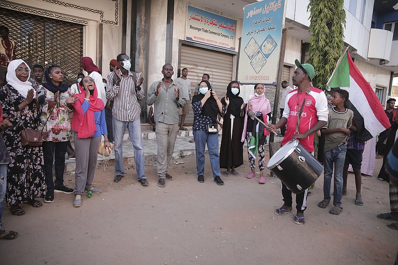 People in Khartoum, Sudan, chant Thursday during ongoing protests against a military takeover.
(AP/Marwan Ali)