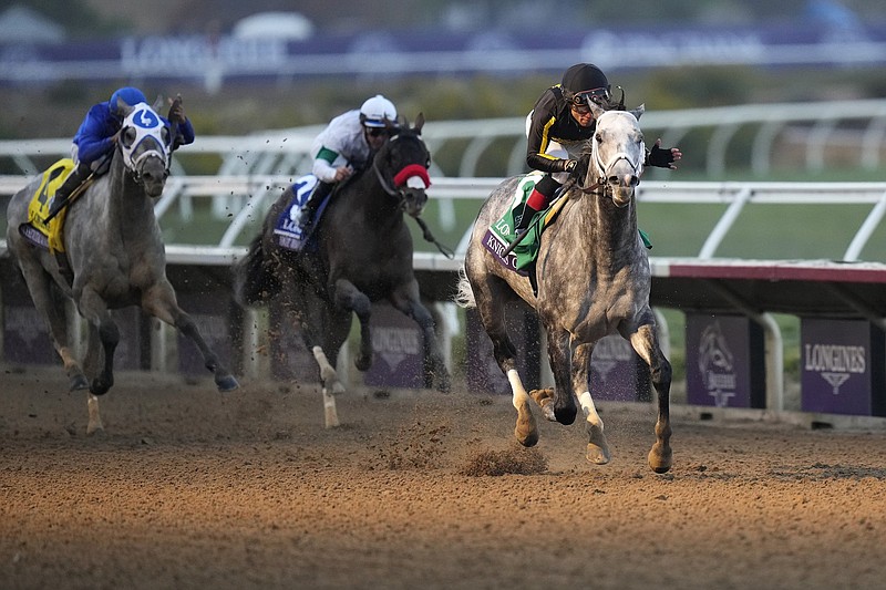 Joel Rosario rides Knicks Go (right) to victory during the Breeders’ Cup Classic on Saturday at the Del Mar Racetrack in Del Mar, Calif. Knicks Go won by 23/4 lengths. More photos at arkansasonline.com/117breeders21/
(AP/Jae C. Hong)