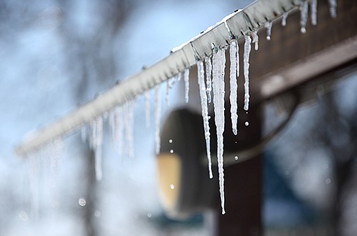 Icicles hang from a pavilion at J.B. Hunt Park in Springdale during February’s extreme weather that  included heavy snow in Little Rock and temperatures as low as 20 degrees below zero in some  parts of the state. The weather strained utilities and customers were hit with spiking utility bills.
(NWA Democrat-Gazette/David Gottschalk)