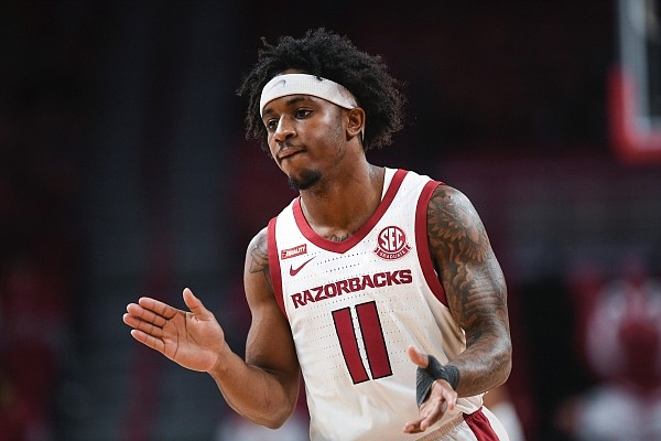 Arkansas guard Chris Lykes (11) reacts on Saturday, October 30, 2021 during a basketball game at Bud Walton Arena in Fayetteville.