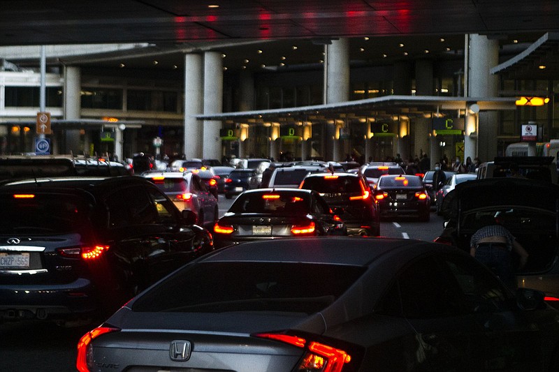 Lines of traffic form Sunday at Toronto’s Pearson International Airport as vaccine opponents stage a drive-by protest. Although the U.S. has allowed Canadians to enter by air for nonessential travel, the land border has been closed to such visitors since March 2020.
(AP/The Canadian Press/Chris Young)