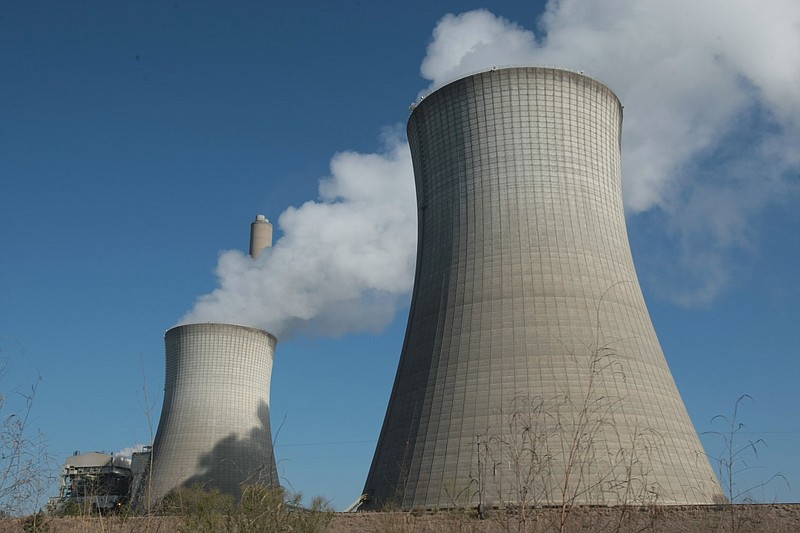 The White Bluff power plant near Redfield is shown in this March 2009 file photo. The coal-fired plant, which was built in 1980, provided nearly 20 percent of Entergy Arkansas' power in 2008. In its 2021 Integrated Resource Plan, Entergy Arkansas reaffirmed that its "cease-to-use coal efforts" included closing the plant at White Bluff by 2028. (Arkansas Democrat-Gazette file photo)