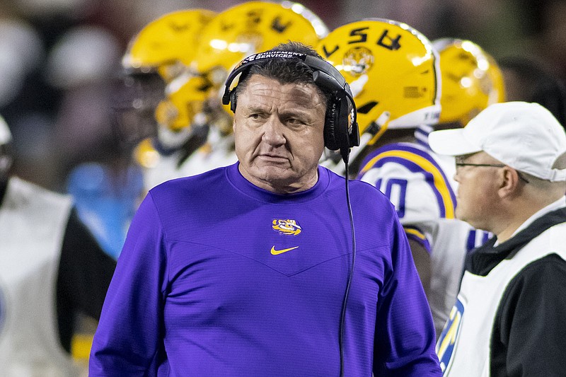 LSU head coach Ed Orgeron paces the sidelines during the second half of an NCAA college football game against Alabama, Saturday, Nov. 6, 2021, in Tuscaloosa, Ala. (AP Photo/Vasha Hunt)