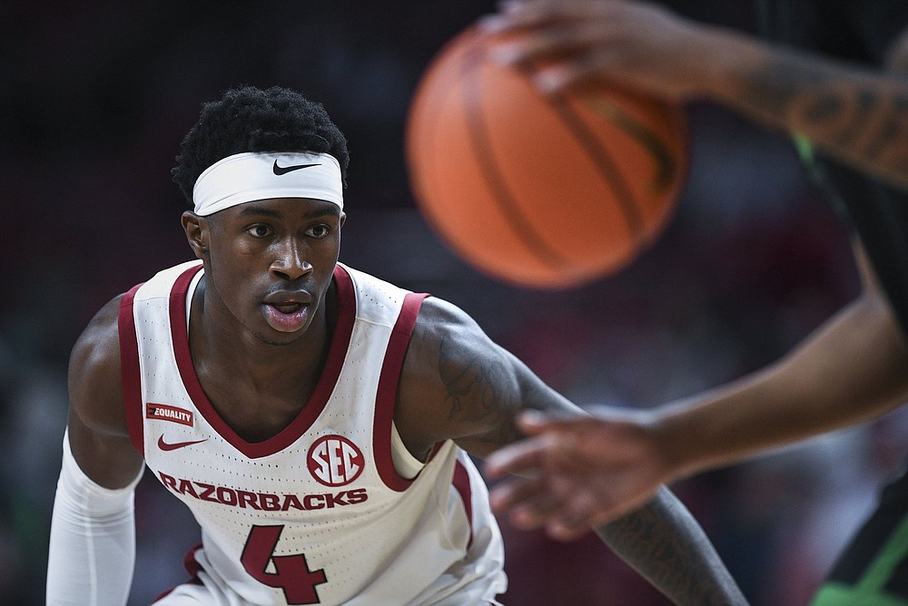 University of Arkansas guard Davonte Davis’ 34 minutes against Mercer were the most a Razorback has played in the past 25 years without attempting a shot or free throw, according to Hogstats.com.
(NWA Democrat-Gazette/Charlie Kaijo)