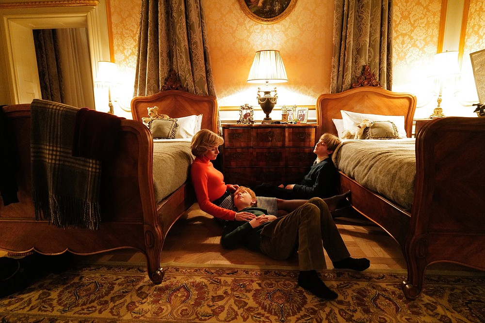 Mommy Dearest: Diana, Princess of Wales (Kristen Stewart) and her sons William (Jack Nielen) and Harry (Freddie Spry) share a quiet moment in Pablo Larrain’s “Spencer.”