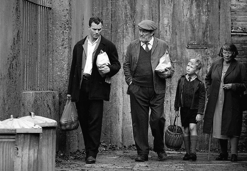 It’s a family affair: Pa (Jamie Dornan), Pop (Ciaran Hinds), Buddy (Jude Hill) and Granny (Judi Dench) somehow make a family in Kenneth Branagh’s memory play “Belfast.”
