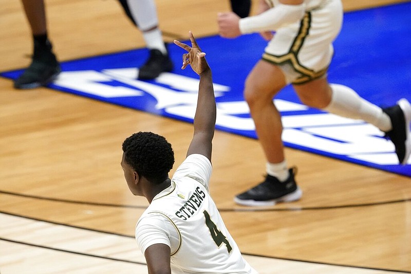 Colorado State guard Isaiah Stevens celebrates sinking a three-point basket in this March 25, 2021, file photo. (AP/Tony Gutierrez)