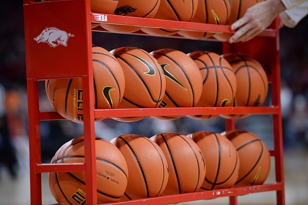 A rack of basketballs is shown during a game between Arkansas and Gardner-Webb on Saturday, Nov. 13, 2021 in Bud Walton Arena in Fayetteville.