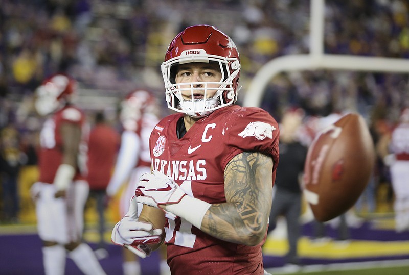 Arkansas linebacker Grant Morgan (31) warms up, Saturday, November 13, 2021 before the start of a football game at Tiger Stadium in Baton Rouge, La. Check out nwaonline.com/211114Daily/ for today's photo gallery. .(NWA Democrat-Gazette/Charlie Kaijo)