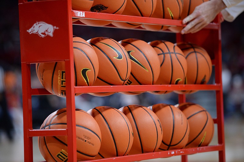A rack of basketballs is shown prior to a game between Arkansas and Gardner-Webb on Saturday, Nov. 13, 2021, in Fayetteville. (NWA Democrat-Gazette/Andy Shupe)