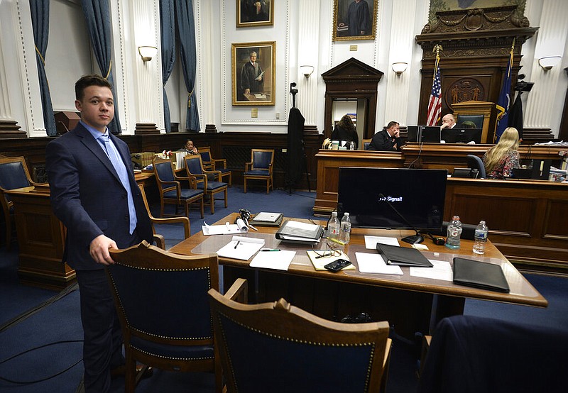 Kyle Rittenhouse waits near his table during a break in his trial at the Kenosha County Courthouse in Kenosha, Wis., on Monday, Nov. 15, 2021. (Sean Krajacic/The Kenosha News via AP, Pool)