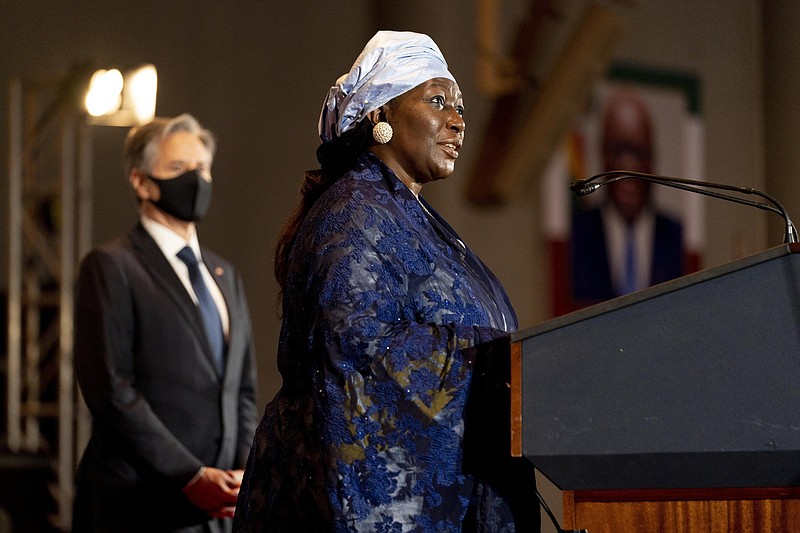 Nigerian Vice President Finda Koroma speaks Friday before Secretary of State Antony Blinken (left) gives a speech on U.S. Africa policy at the Economic Community of West African States in Abuja, Nigeria. More photos at arkansasonline.com/1120blinken/
(AP/Andrew Harnik)