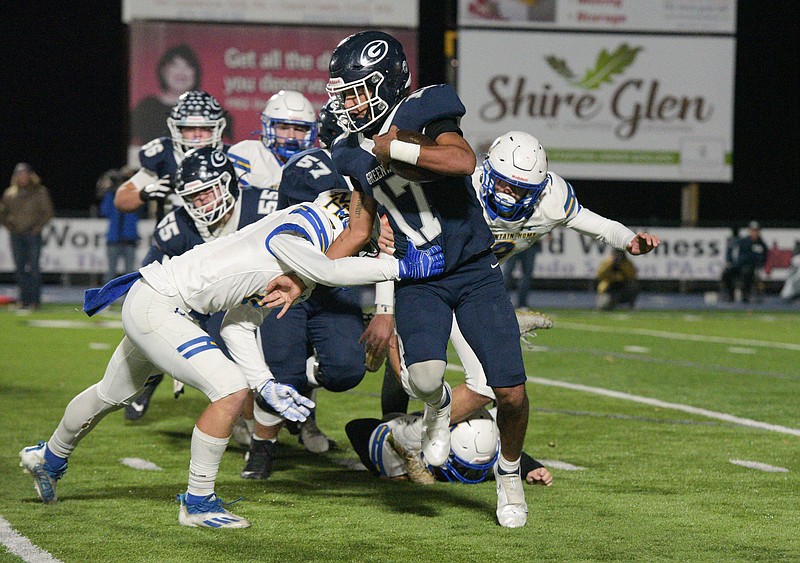 Greenwood running back Javon Williamson (17, right) carries during the first half Friday night against Mountain Home in a Class 6A quarterfinal game at Smith-Robinson Stadium in Greenwood. More photos are available at arkansasonline.com/1120mhghs/
(NWA Democrat-Gazette/Hank Layton)