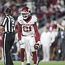 Arkansas cornerback Montaric Brown (21) comes up with a fumble recovery during a game against Alabama on Saturday, Nov. 20, 2021, in Tuscaloosa, Ala.