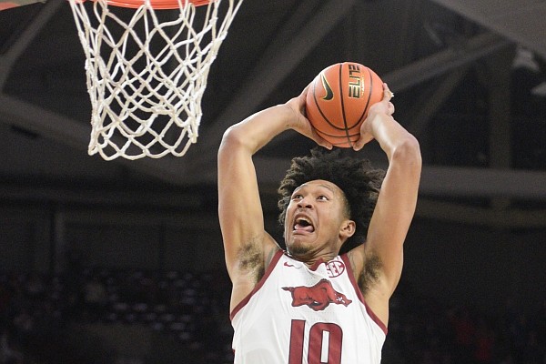 Jaylin Williams dunks the ball after JD Notae forced a turnover on Wednesday, Nov. 17, 2021, during the second half of a 93-80 win over Northern Iowa inside Bud Walton Arena in Fayetteville.