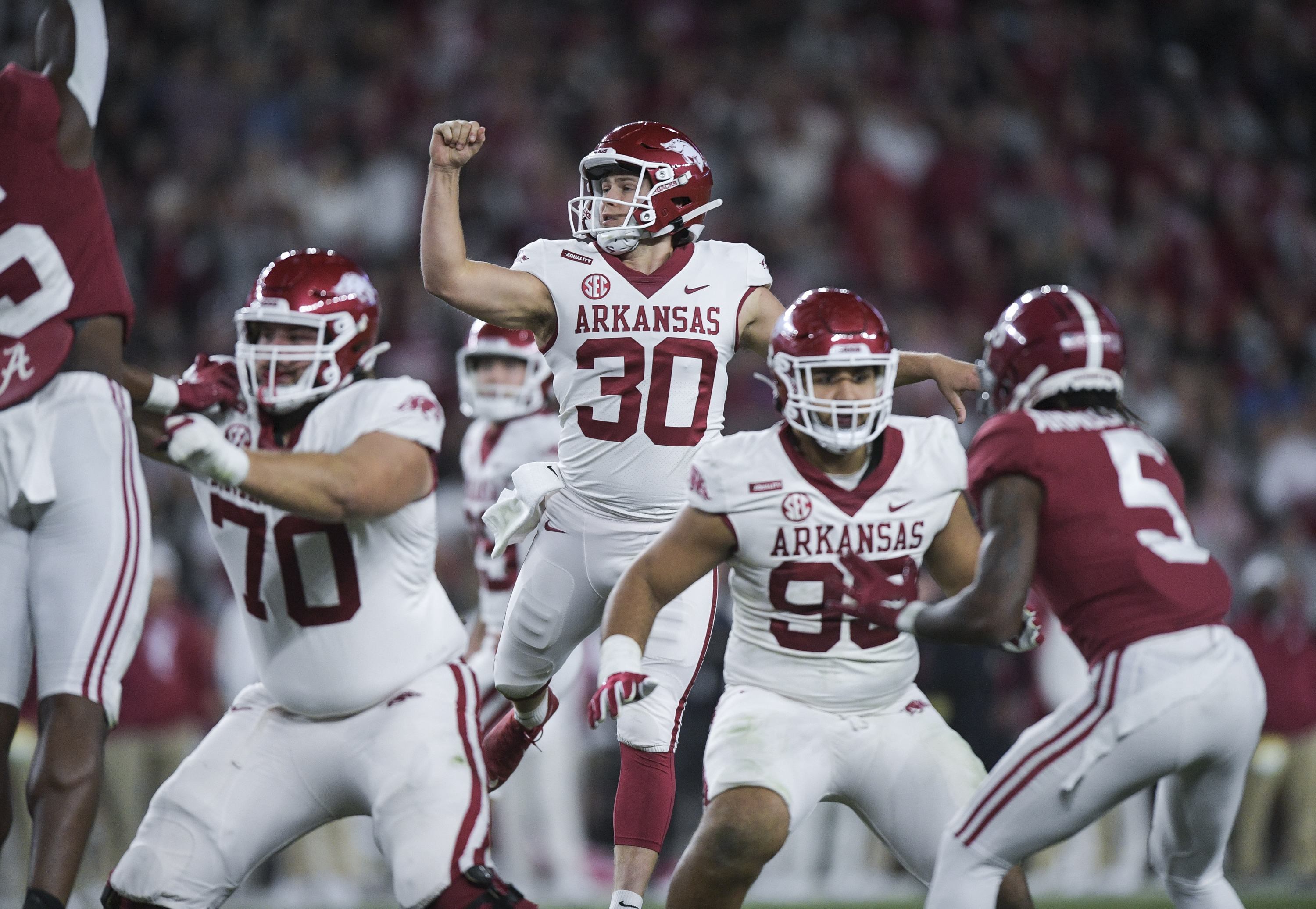 Do-it-all man: Hogs' Bauer punts, holds, passes and runs, too - WholeHogSports