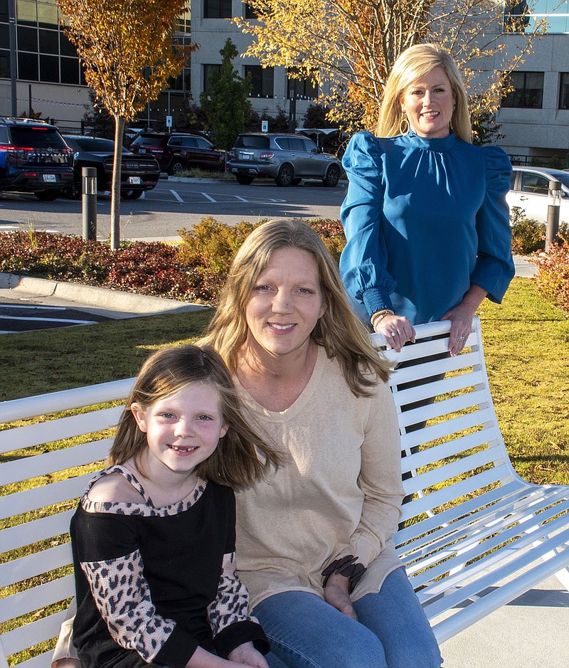 Willow with her mom, Brittney Gill, and Ashley Parker (Arkansas Democrat-Gazette/Cary Jenkins)