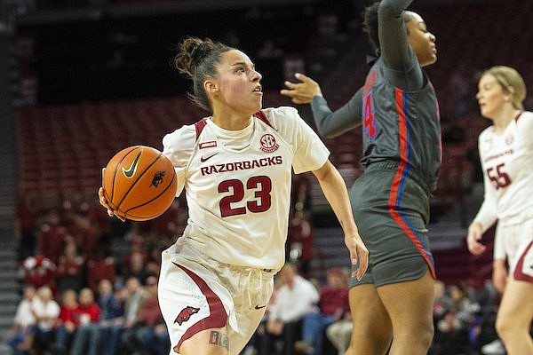 Arkansas guard Amber Ramirez (23) drives to the basket during a game against SMU on Monday, Nov. 22, 2021, in Fayetteville.