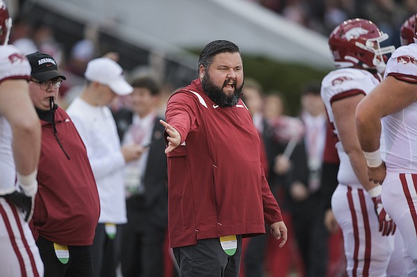 Arkansas offensive line coach Cody Kennedy is shown prior to a game against Alabama on Saturday, Nov. 20, 2021, in Tuscaloosa, Ala.