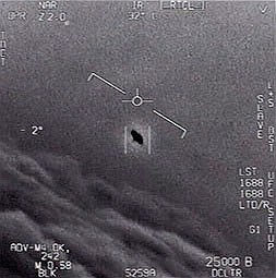 This image provided by the Department of Defense shows an object being tracked by military pilots as it soars high in the clouds, against the wind.
(AP/Department of Defense)