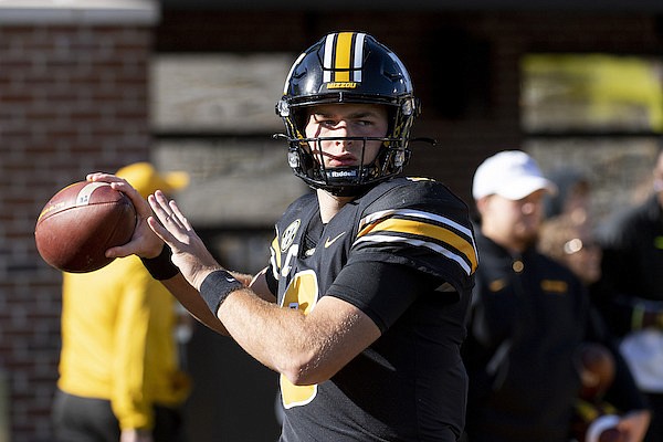 Missouri quarterback Connor Bazelak warms up before the start of an NCAA college football game against Texas A&M Saturday, Oct. 16, 2021, in Columbia, Mo. (AP Photo/L.G. Patterson)