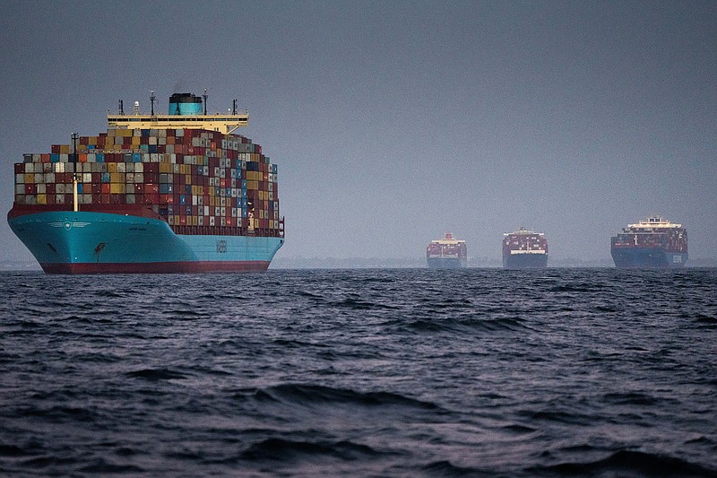 Container ships wait to enter the Port of Los Angeles in October, when inflation hit a three-decade high.
(Erin Schaff/The New York Times)