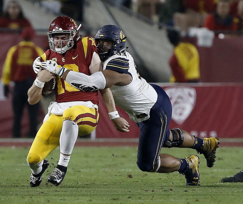 Former Little Rock Catholic standout Luc Bequette (right), who redshirted at Cal as a freshman in 2015, is returning to the Bears after a year at Boston College. He is among players taking advantage of extended eligibility the NCAA granted players because of the coronavirus pandemic.
(AP file photo)
