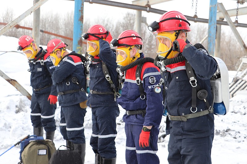 Rescuers prepare to work on a coal mine fire Thursday near the Siberian city of Kemerovo, Russia.
(AP/Russian Ministry for Emergency Situations)