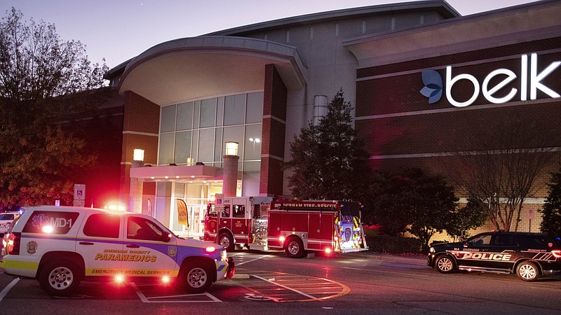 Emergency vehicles congregate outside Southpoint Mall in Durham, N.C., after three people, including a 10-year-old, were wounded in a Friday afternoon shooting.
(AP/The News & Observer/Scott Sharpe)